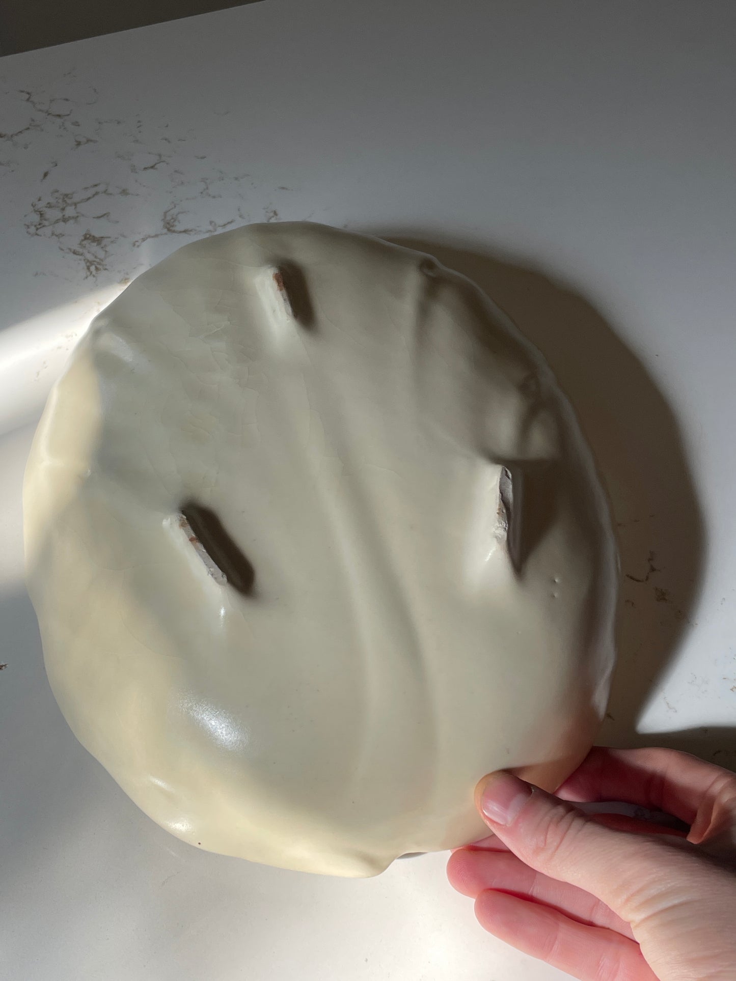 Tri-footed Cream Ceramic Leaf Bowl with Scalloped Edges