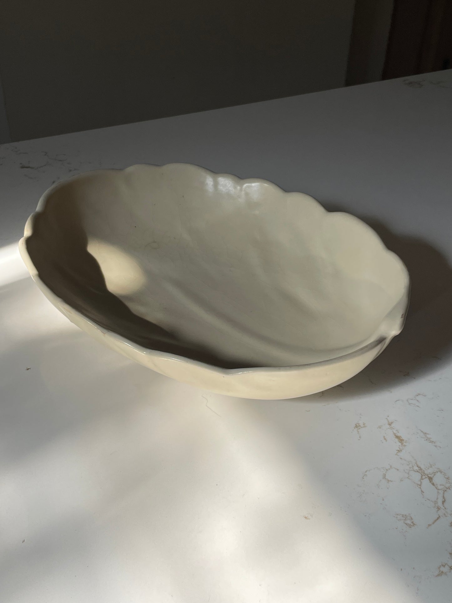 Tri-footed Cream Ceramic Leaf Bowl with Scalloped Edges