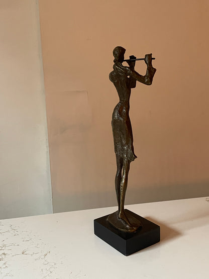 Sculpted Bronze Flutist in Windswept Dress on Black Podium