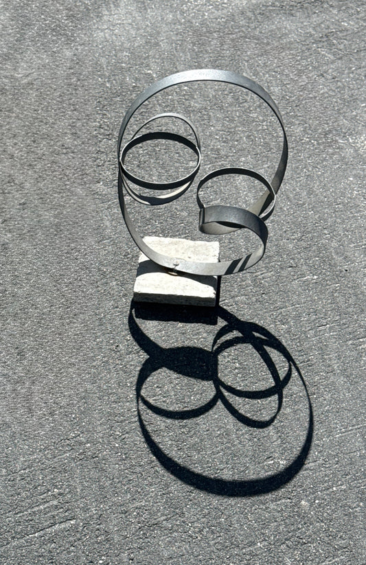 Minimalist Metal Sculpture Dual Loop on Concrete Base