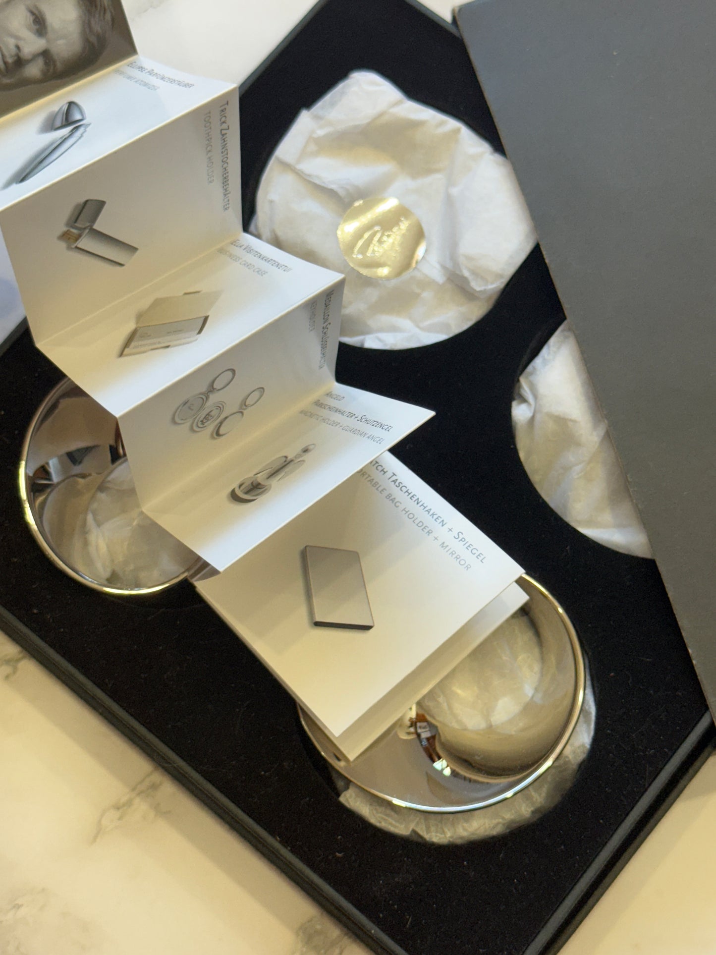 New in box Vintage Phillipi Mirrored Silver "Swirl" Napkin Rings sold as set of 4