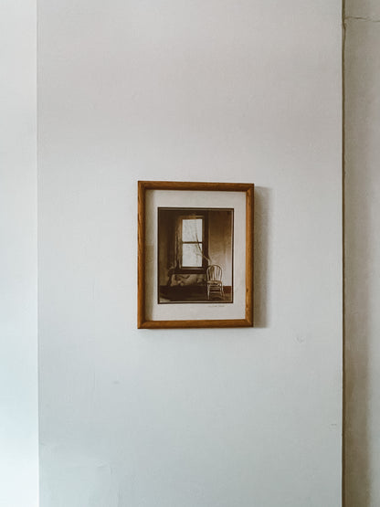 Framed Chair and Window Photo by Michael Stipele